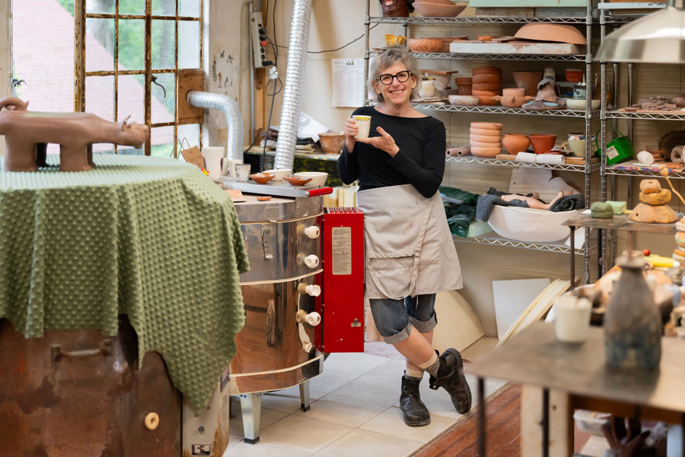 Ceramic artist Lisa Gluckin in her Grovewood Village studio.