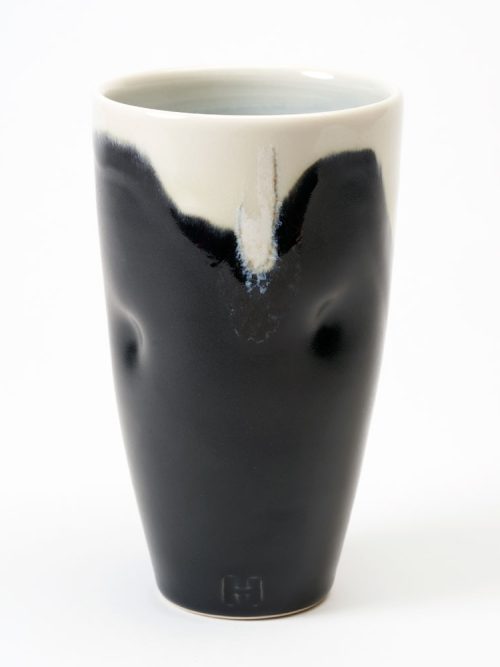A porcelain tumbler handcrafted by Phil Haralam.