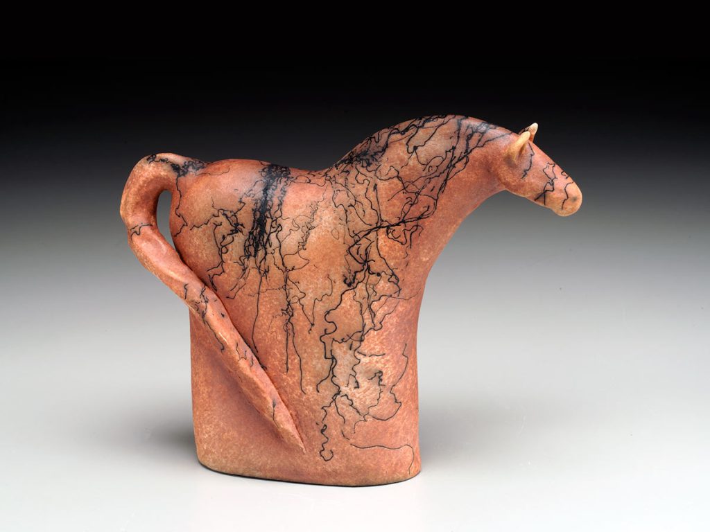 Ceramic horse sculpture by artist Tina Curry.