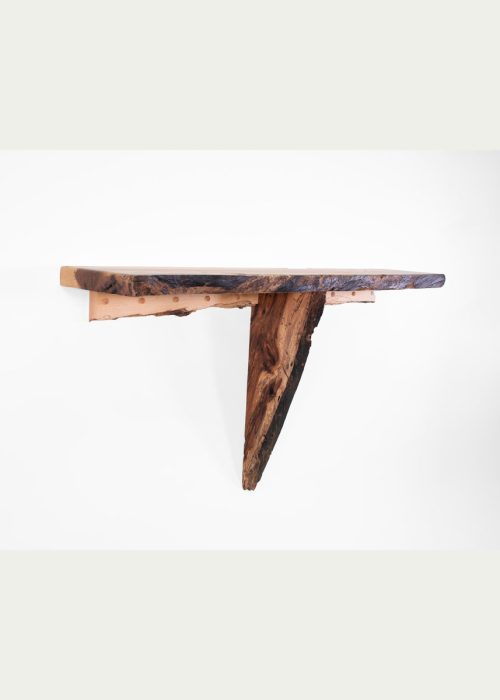 A live edge wall shelf handcrafted by Tom Elman.