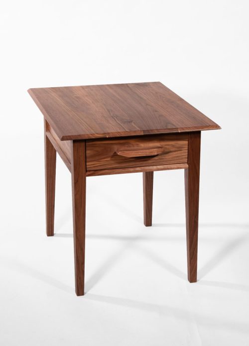 Handcrafted walnut end table by artist Tom Elman.