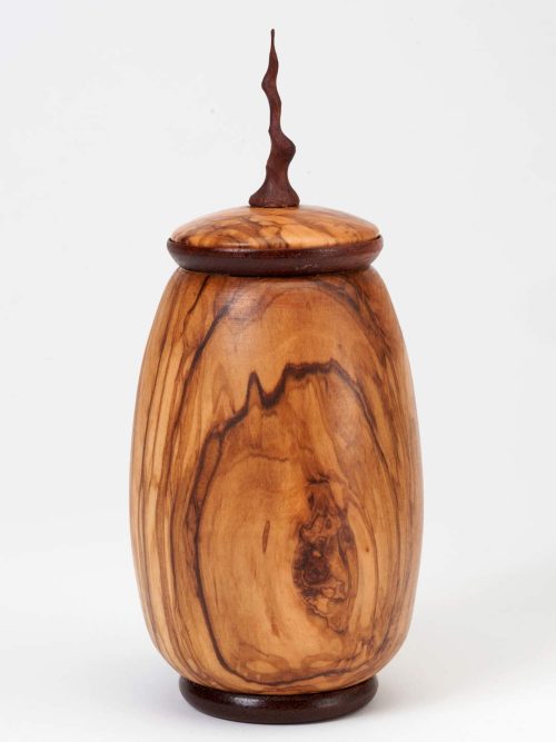 A handcrafted olive wood vessel by Lee Area.