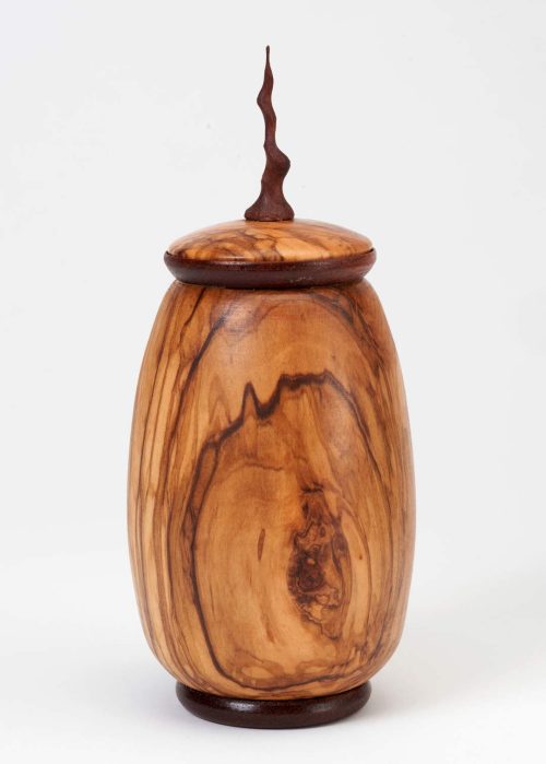 A handcrafted olive wood vessel by Lee Area.