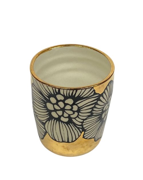 Gold dogwood tumbler by Nicole Hsieh.