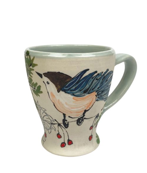 Irish Coffee mugs with nuthatches, ferns, and winter berries by artist Rebekah Strickland.