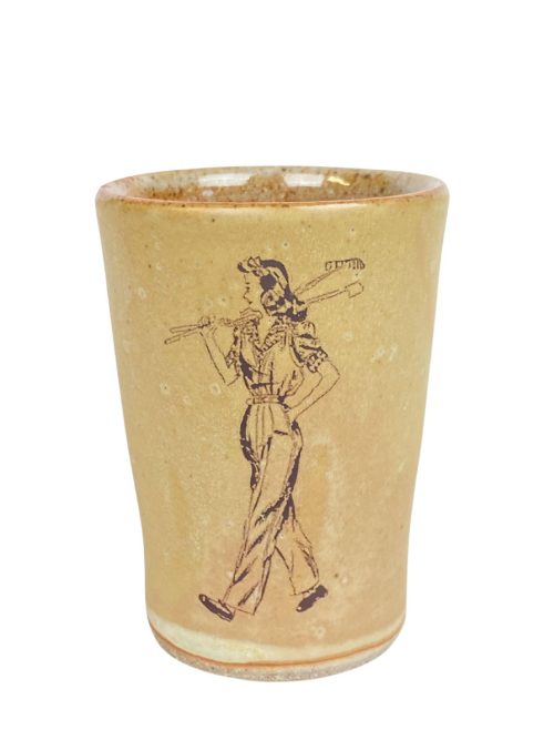 Ceramic golfer cup by artist Julie Covington.