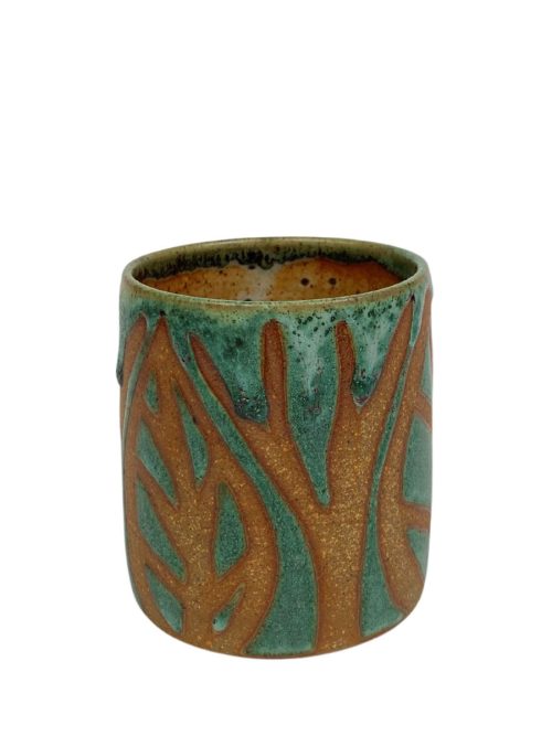 Ceramic cup by Magnum Pottery.