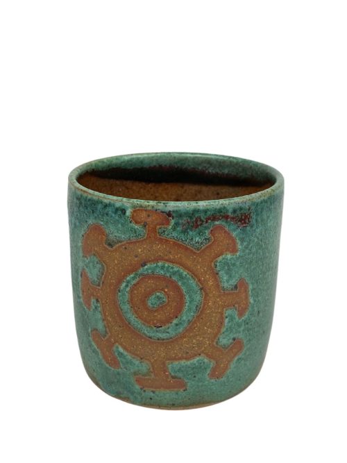 Green ceramic cup by Mangum Pottery.