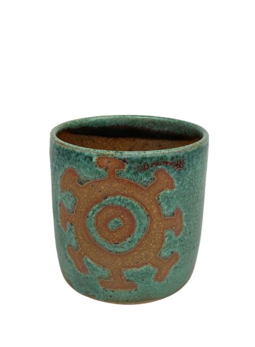 Green ceramic cup by Mangum Pottery.