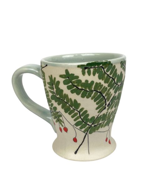 Ceramic irish coffee mugs by artist Rebekah Strickland.