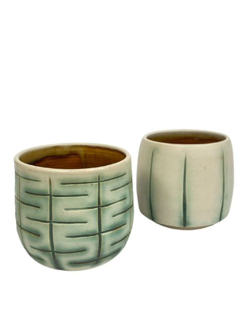 Ceramic carved tumbler set by Ruth Hesse.