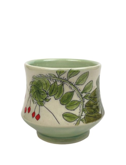 Ceramic sipper with ferns and winter berries by artist Rebekah Stickland.