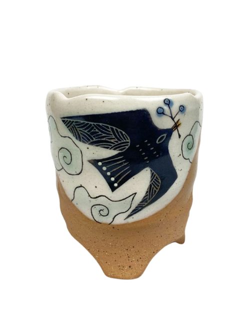 Ceramic soaring bird tumbler by Reiko Miyagi.