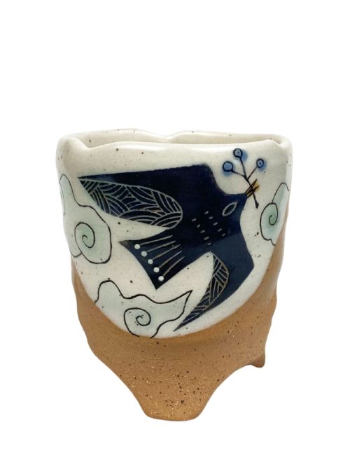 Ceramic soaring bird tumbler by Reiko Miyagi.