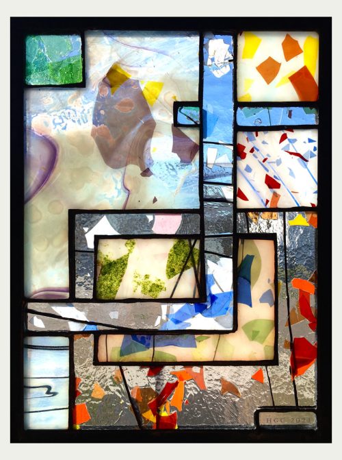 A stained glass window panel titled Fractured by Jacob Hinnenkamp of Hinnenkamp Glass Crafters.