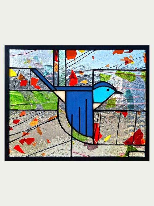 A stained glass window panel titled Mountain Bluebird by Hinnenkamp Glass Crafters.