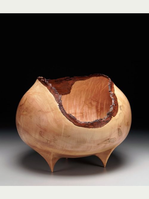 A quilted ambrosia maple vessel by artists Tina and Bill Collison.