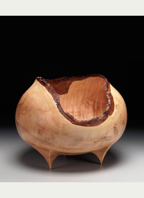 A quilted ambrosia maple vessel by artists Tina and Bill Collison.